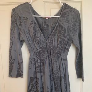 Long sleeve V neck blouse.